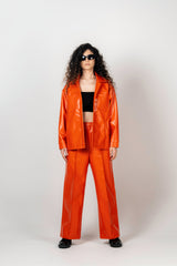 BYSARAD | FAUX LEATHER PANTS - ORANGE